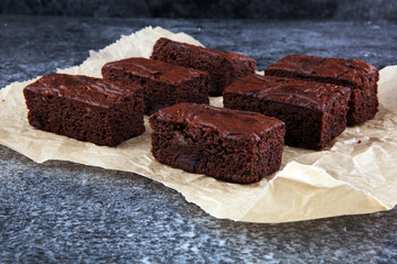 homemade chocolate brownies on grey vintage background, chocolate cake concept