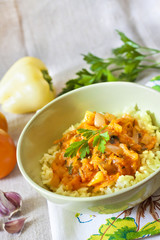 Steamed rice with stewed vegetables and turmeric