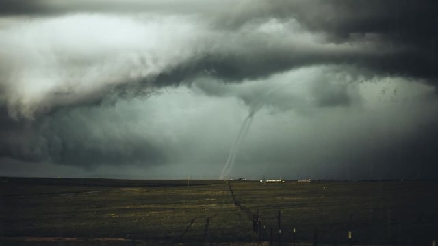 Cinemagraph time lapse of tornado on farm
