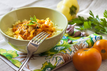 Steamed rice with stewed vegetables and turmeric