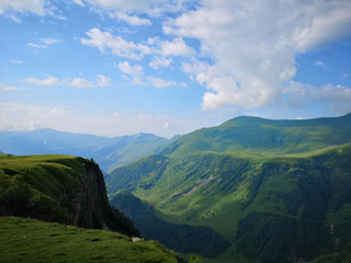 Fototapeta premium Green mountains peaks during a summer