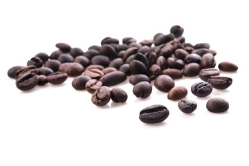 Fresh coffee beans with wooden spoon isolated on white background