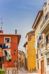 Fototapeta na wymiar Colorful houses with drying laundry in Tudela, Spain