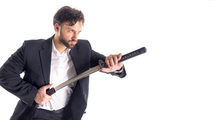 Close-up Of Businessman Removing Sword Over White Background.