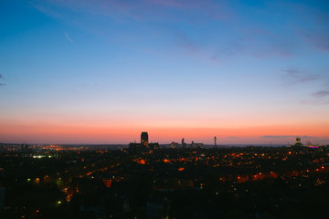 Fototapeta premium Sunset over liverpool with liverpool cathedral and radio city tower silhouettes