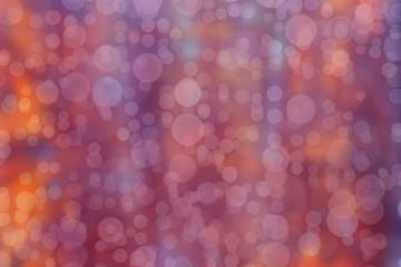 abstract blurred orange-pink background with bokeh circles