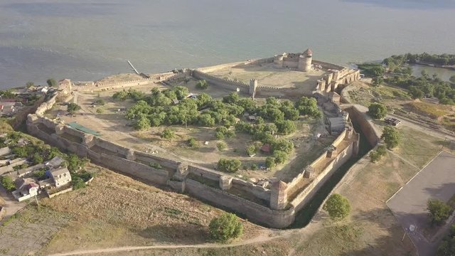 Aerial view from drone to ancient fortress Akkerman which is on the bank of the Dniester estuary, Bilhorod-Dnistrovskyi city, Odessa region, Ukraine
