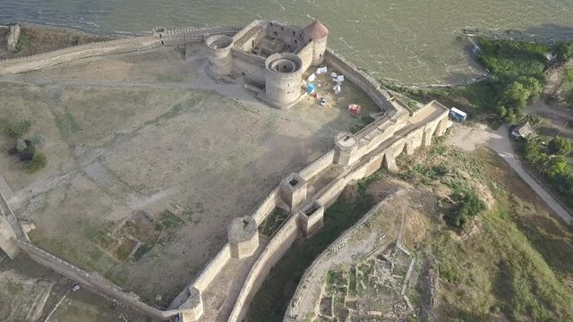 Aerial view from drone to ancient fortress Akkerman which is on the bank of the Dniester estuary, Bilhorod-Dnistrovskyi city, Odessa region, Ukraine