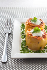 Zucchini stuffed with meat and vegetables