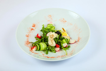 Salad with eggs, radish and greens