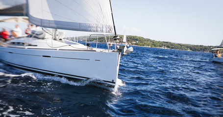 Fototapeta premium Nice view to nacht sailing in open sea at windy day