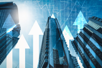 the abstract image of the skyscraper image overlay with business chart image. the concept of accounting, financial, economy and investment.