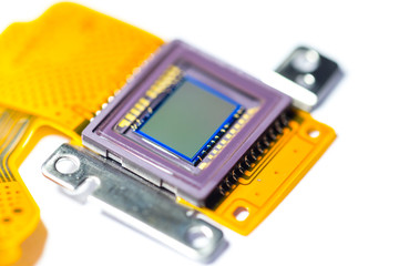 A CMOS sensor isolated over white background.