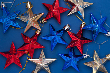 Merry Christmas and Happy New Year. Flat lay, top view holiday decoration stars. Place for text