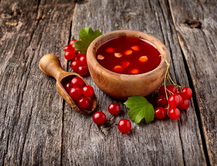 Viburnum oculus. Guelder rose on wooden background