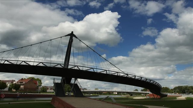 Kortrijk, Belgium : pedestrian bridge over the river timelapse