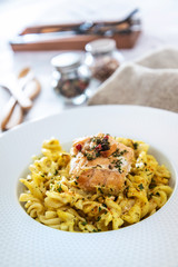 tasty pasta with salmon on a the table