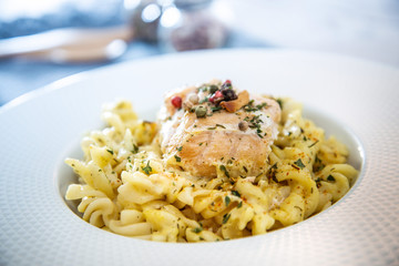 tasty pasta with salmon on a the table