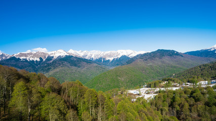 Fototapeta na wymiar beautiful landscape with snow covered of Caucasus mountain peaks