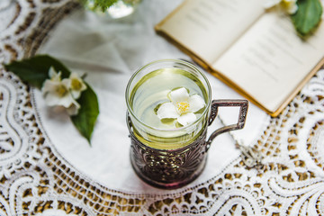 cup of green tea on a wicker table