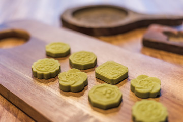 green mooncake on table