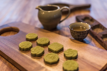 green mooncake on table