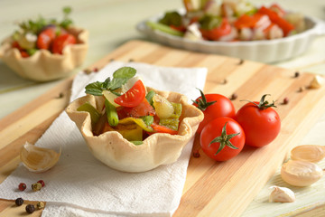 small savory pies with assorted vegetables