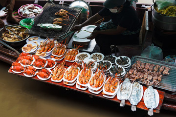 Grilled seafood at floating market.