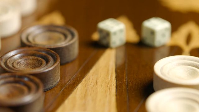 Winning layout of devils bones on the backgammon board