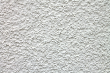 Grunge and an old aged white wall textured background.