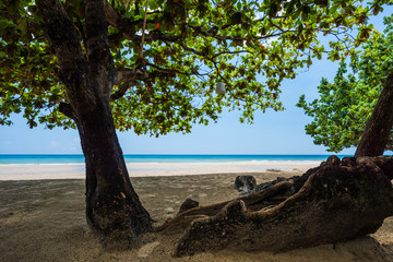 Sand beach and blue sky background