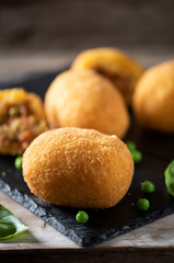 arancini di riso, fried risotto rice balls, italian sicilian food