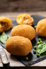 arancini di riso, fried risotto rice balls, italian sicilian food