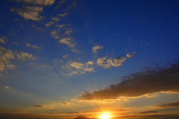 Naklejka na ściany i meble Beautiful sunset with blue sky and clouds
