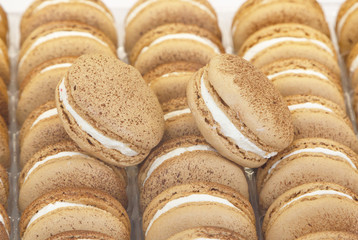 close up of macaroons in box