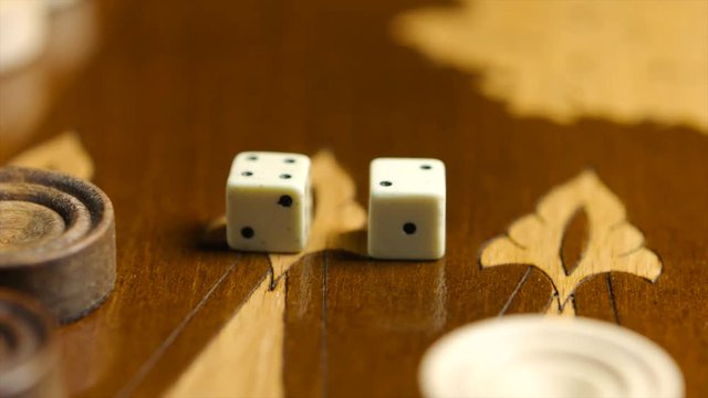 Close up dices on the backgammon surface
