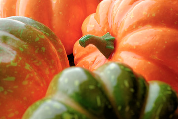 Group of orange and green pumpkins