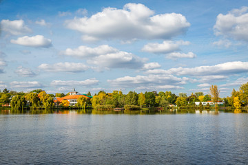 Panoramic view of amazing landscape with a lake and blue sky with white clouds. Salt lake (Sosto)...