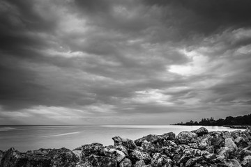 Dramatic black and white image of views from the coastline in Montego Bay, Jamaica.