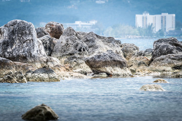 Huge rock boulders along coastline in Montego Bay, Jamaica.