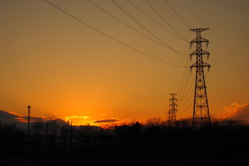 夕焼けと鉄塔, Transmission towers and the sky at sunset.