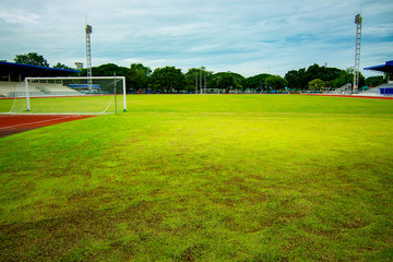 Obraz premium Soccer field in the stadium and Sky