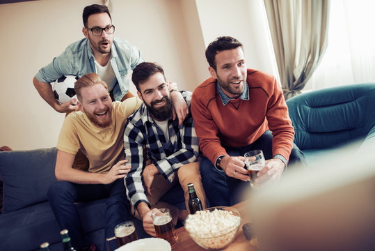 Group Of Friends Watching Sport Together