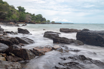 waves crashing on rocks