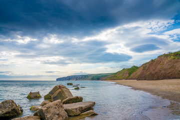 Filey bay Beach on Yorkshire coast near Reighton Gap and Speeton at sunrise