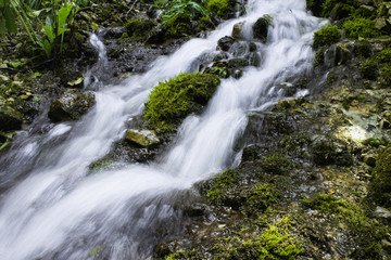 Fototapeta na wymiar waterfall in the mountains on a long exposure