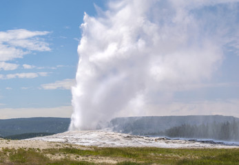 Old Faithful erupting in Yellowstone National Park