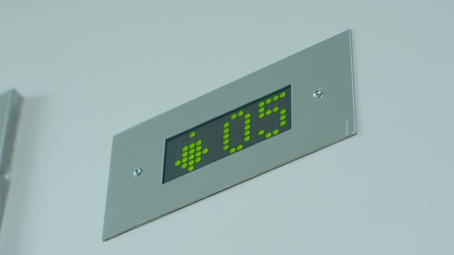 Digital scoreboard elevators with floor