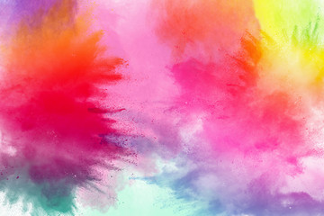 Fototapeta Freeze motion of colored powder explosions isolated on white background obraz