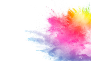 Fototapeta na wymiar Freeze motion of colored powder explosions isolated on white background